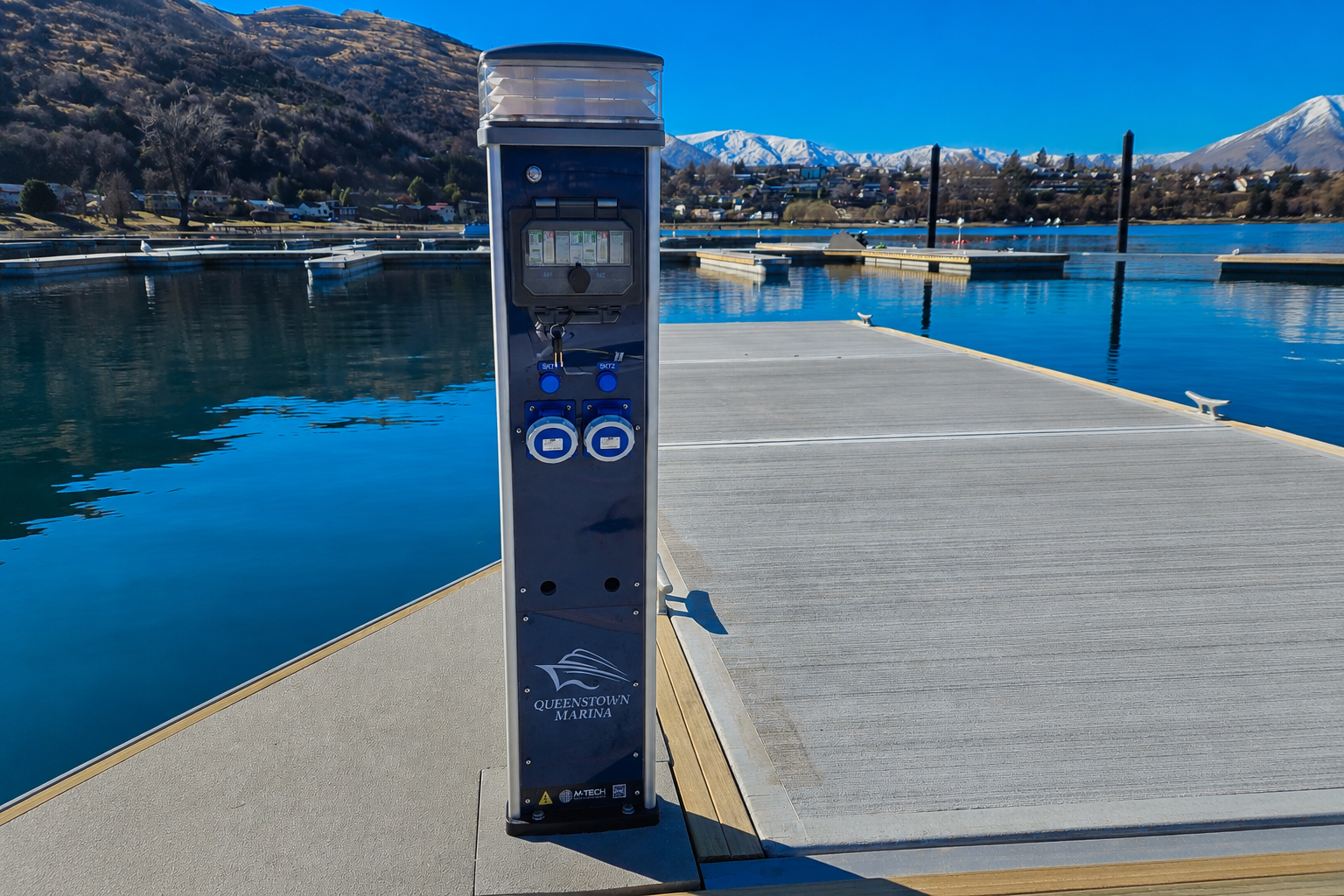 M-TECH Sterling Service Pedestal installed at Queenstown Marina providing power and water services to marina berths in New Zealand.